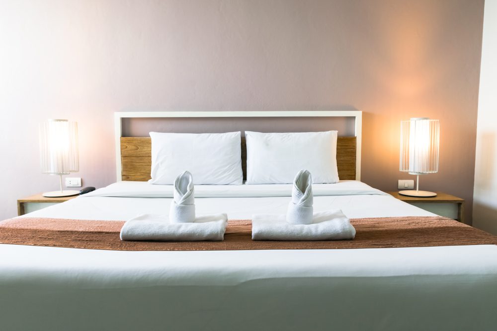 Interior of a luxury double bed hotel bedroom