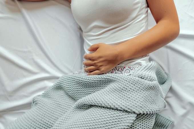 12 Things That Cause Abdominal Pain And Cramping After Sex, Explained by Experts