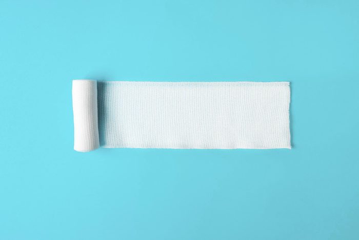 medical bandage on bright blue background